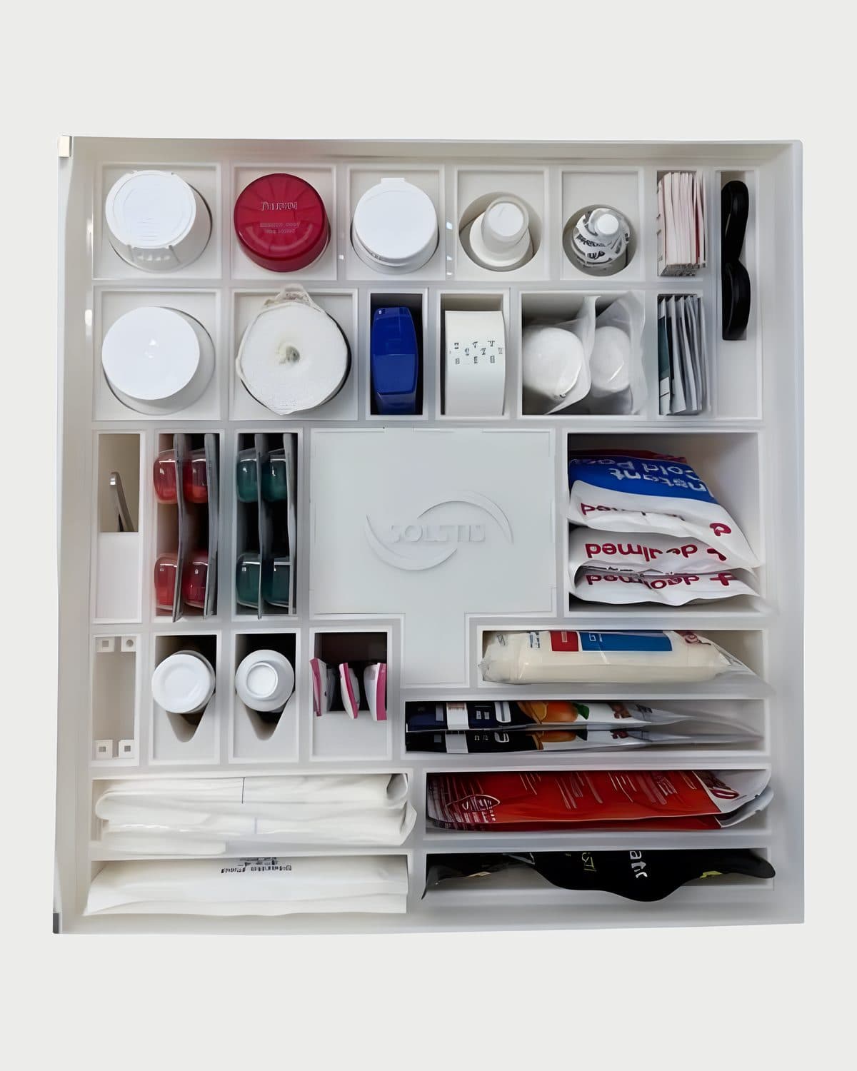 Inside the Solstis cabinet: medicines and first-aid supplies, each in its own compartment.